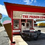 ice cream shop with outdoor seating along the highway